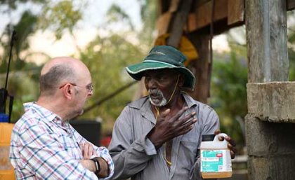 Photo: Michael Furlong. Talking with a farmer in Fiji about the problems associated with using pesticides researcher-talking-with-fijian-farmer-about-problems-associated-with-pesticides